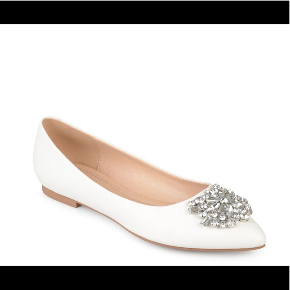 Cute white flat with jeweled brooch.